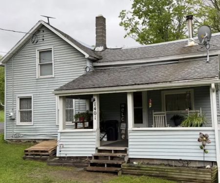 Just In Time Roofing and Seamless Gutters