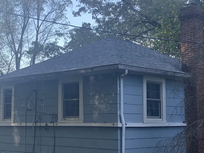 Wallace Roofing siding gutter sign window commercial residential flat metal asphalt shingle drywall insulation repairs Picture 1