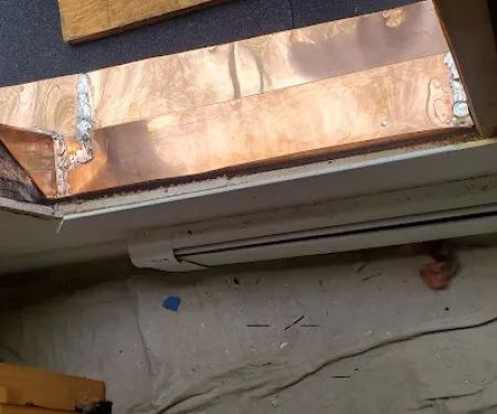 L Paulich Roofing Inc