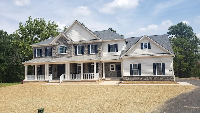 EXTERIORS ASSOCIATES INC. 30 Years of Service Picture 2