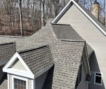 Rubman Construction LLC Roofing & Siding Service