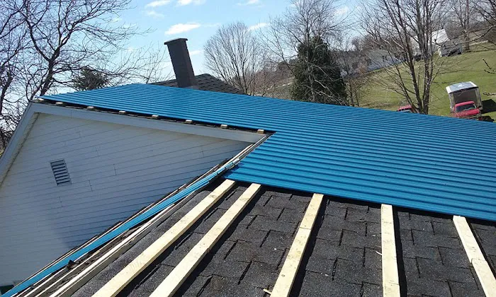 Excalibur Roofing, Siding, Windows, & Gutters Picture 1