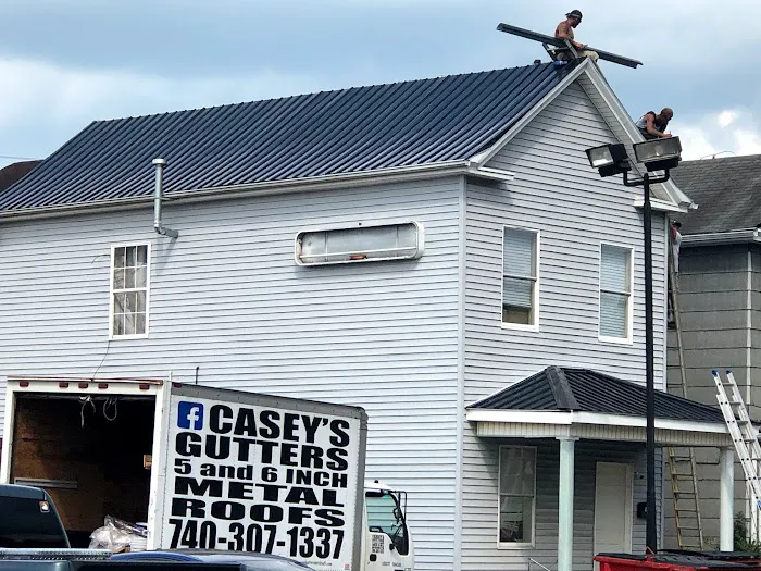Casey's continuous gutters, and metal roofs. Picture 5