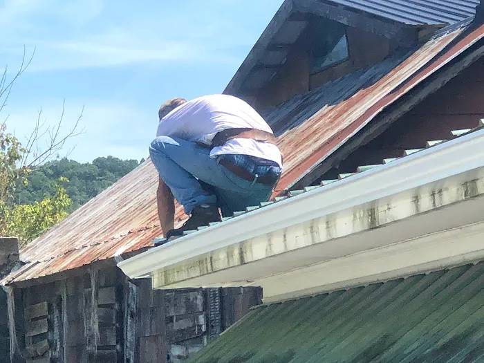 Casey's continuous gutters, and metal roofs. Picture 7