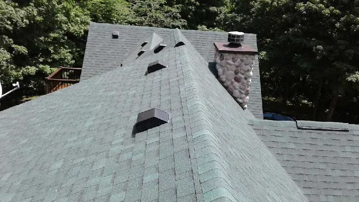 Man and Husky Roofing and Repair Picture 4