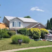 Simpson Contracting Roofing & Restoration ico