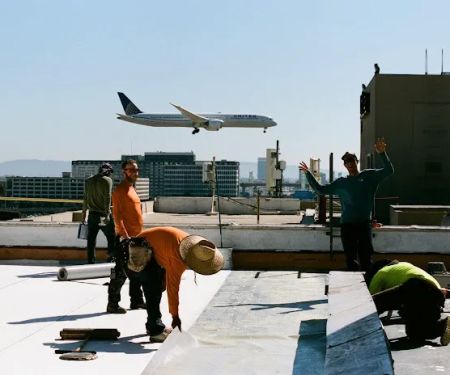 Swell Roofing Inc