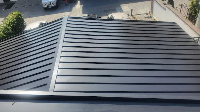 AR91 METAL ROOFING INC Picture 7