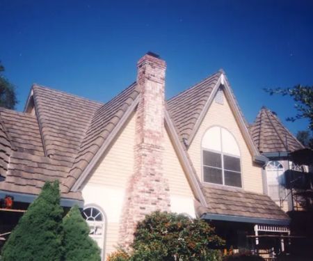 T K Roofing Inc