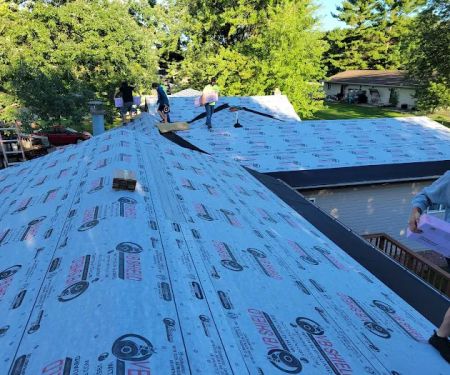 Economy Roofing Inc