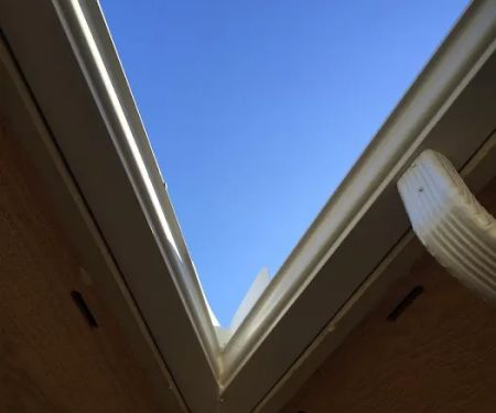 AMERICAN SEAMLESS GUTTERING INC