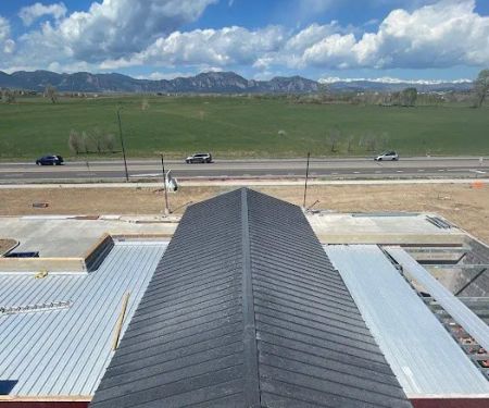 Aslan Corporation - Roofing and Exteriors
