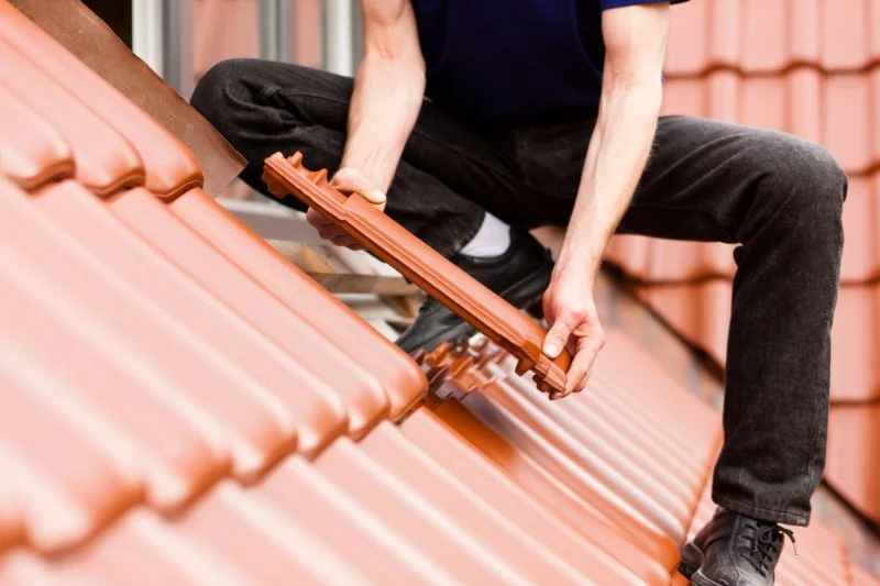 How to Deal with Roofing Scams and Avoid Contractor Fraud