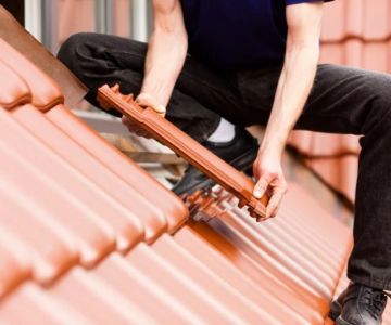 How to Deal with Roofing Scams and Avoid Contractor Fraud