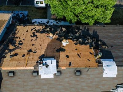 Pros and Cons of Re-Roofing vs. Full Roof Tear-Off
