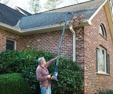 How to Clean Your Roof with a Leaf Blower for Regular Debris Maintenance