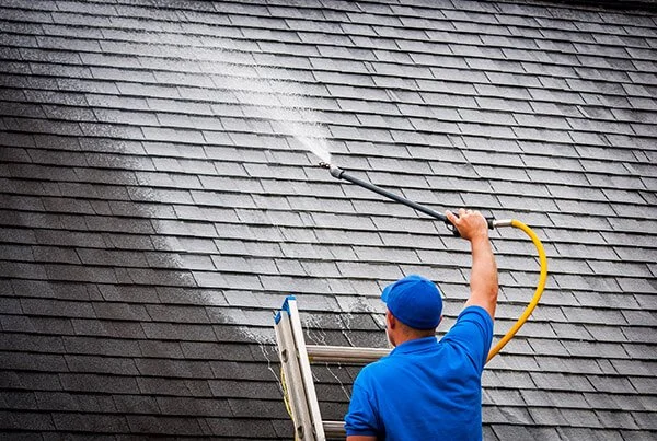 How to Clean Your Roof with a Soft Wash System to Preserve Shingle Granules