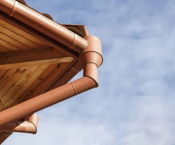 How to Choose the Right Gutter System to Protect Your Roof and Foundation