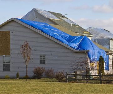 Does Homeowners Insurance Cover Roof Replacement? Understanding Wind, Hail, and Wear & Tear