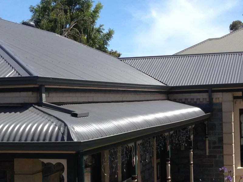 The Benefits of a Reflective Coat of Paint on a Metal Roof for Energy Savings