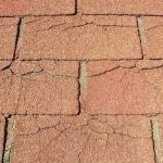 The Signs of UV Damage on an Asphalt Shingle Roof: Cracking and Curling