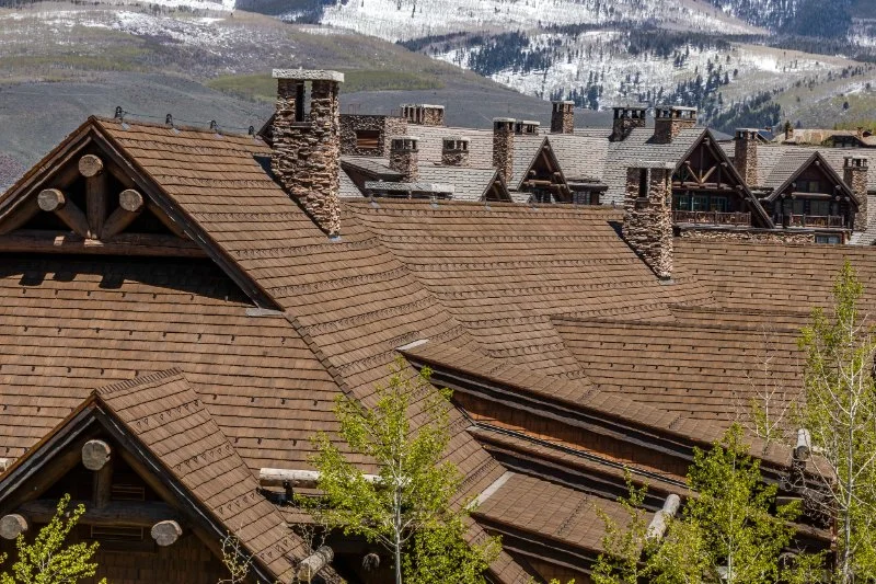 The Best Roof Styles for High Rainfall and Snowfall Areas