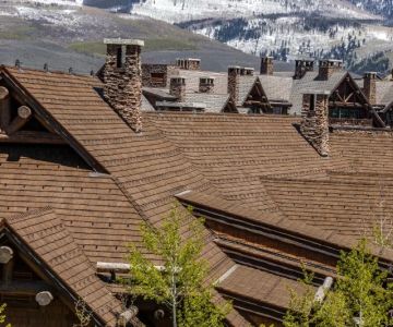 The Best Roof Styles for High Rainfall and Snowfall Areas