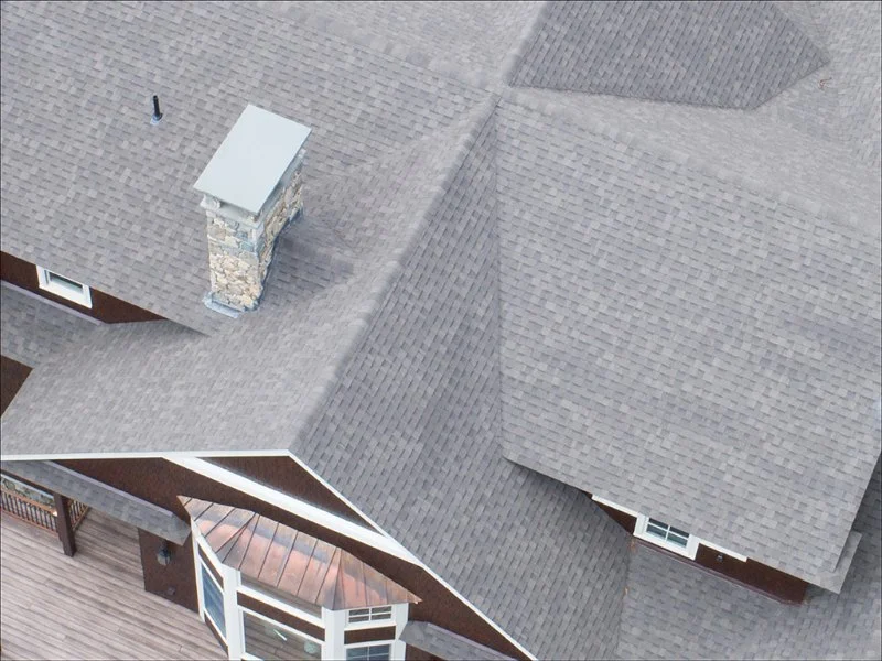 What is a Roofing Cricket? Why You Need One Behind a Large Chimney