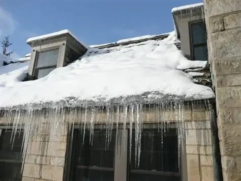 What is a Roofing Ice Dam? How Heat Loss from Your Home Creates This Problem