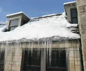 What is a Roofing Ice Dam? How Heat Loss from Your Home Creates This Problem