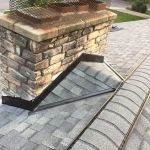 Why You Need a Roofing Cricket Behind a Large Chimney to Prevent Damage