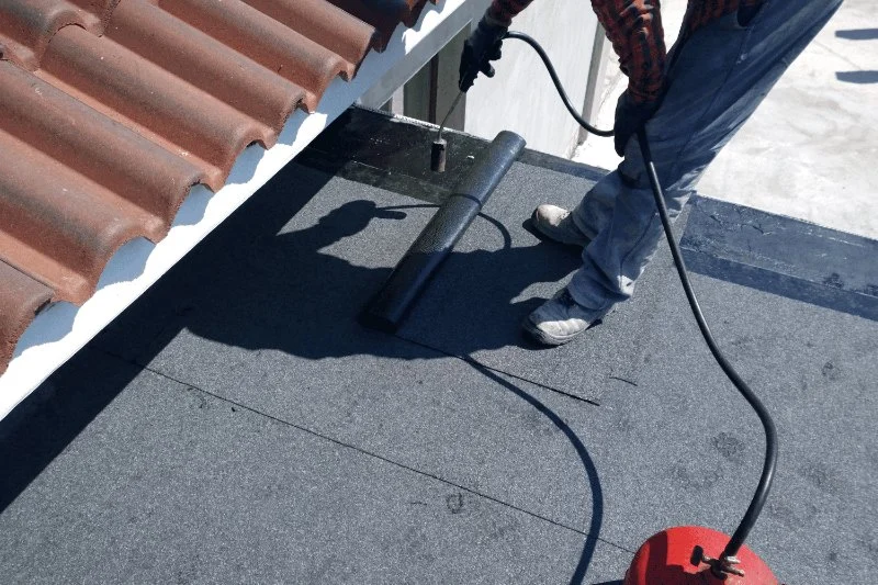 Installing a Modified Bitumen Roof for a Low-Slope Garage: Step-by-Step Process