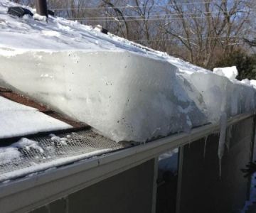 The Signs of Ice Dam Damage on Your Roof and in Your Attic