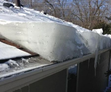 The Signs of Ice Dam Damage on Your Roof and in Your Attic