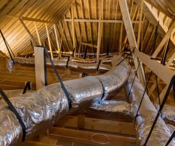 The Role of Attic Insulation in Roof Health: Regulating Temperature and Preventing Ice Dams