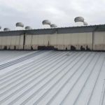 The Impact of Industrial Pollution on the Degradation of Roofing Materials
