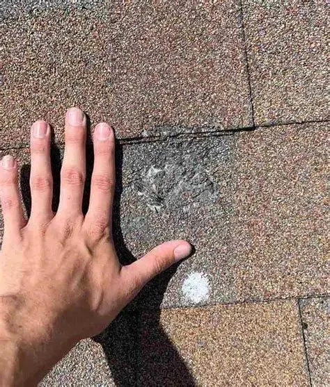 How to Spot Hail Damage on Different Roofing Types (Asphalt, Metal, Tile)
