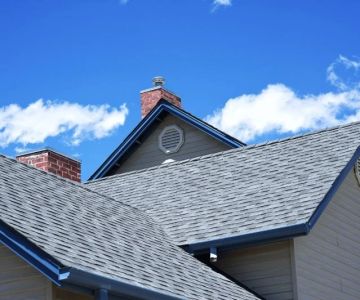 What is a Roofing Cricket? How It Prevents Water Buildup Behind Chimneys