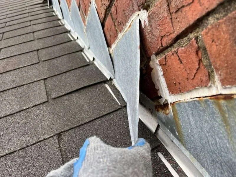 The Importance of Roof-to-Wall Flashing in Preventing Leaks at Intersections
