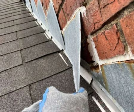 The Importance of Roof-to-Wall Flashing in Preventing Leaks at Intersections