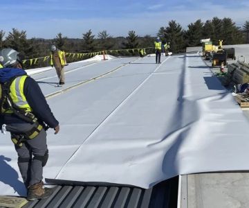 The Process of Installing a TPO Roof with Welded Seams for a Perfect Seal