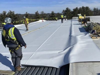 The Process of Installing a TPO Roof with Welded Seams for a Perfect Seal