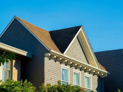 How to Choose a Roof Color That Will Help Your Home Blend into Nature