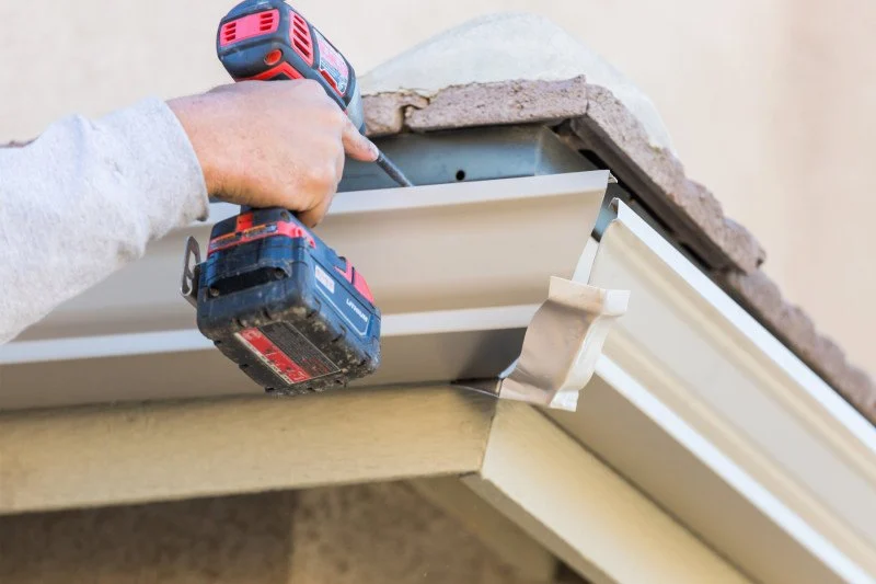 Roof Replacement Cost with Gutters and Downspouts: Complete Guide