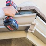 Roof Replacement Cost with Gutters and Downspouts: Complete Guide