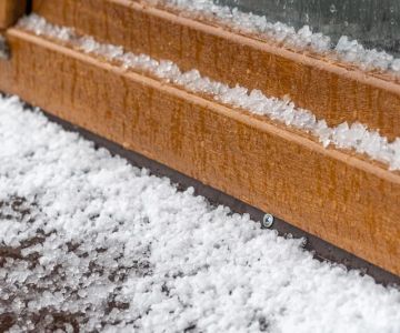 Immediate Steps for Hail Damage Roof Repair After a Storm